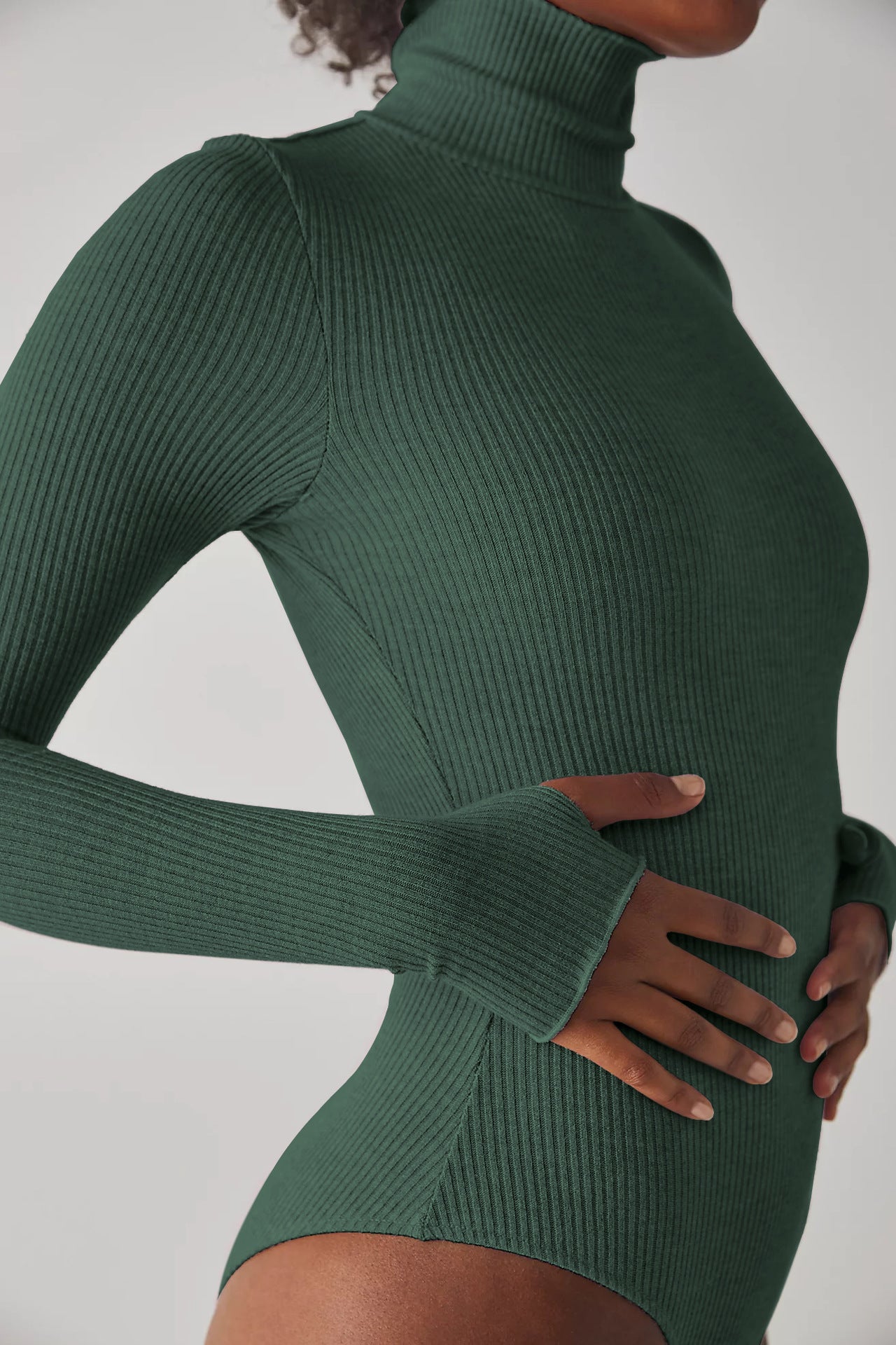 Green ribbed long sleeve bodysuit with high collar long design for women