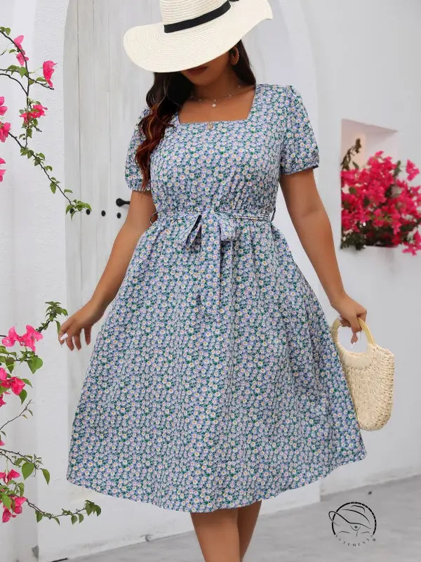 Light blue floral summer dress with square neck, puff sleeves, tie waist