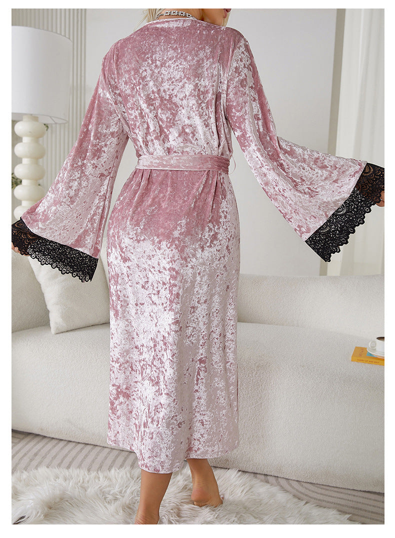 Pink crushed velvet lengthened bathrobe with black lace trim for luxurious home wear