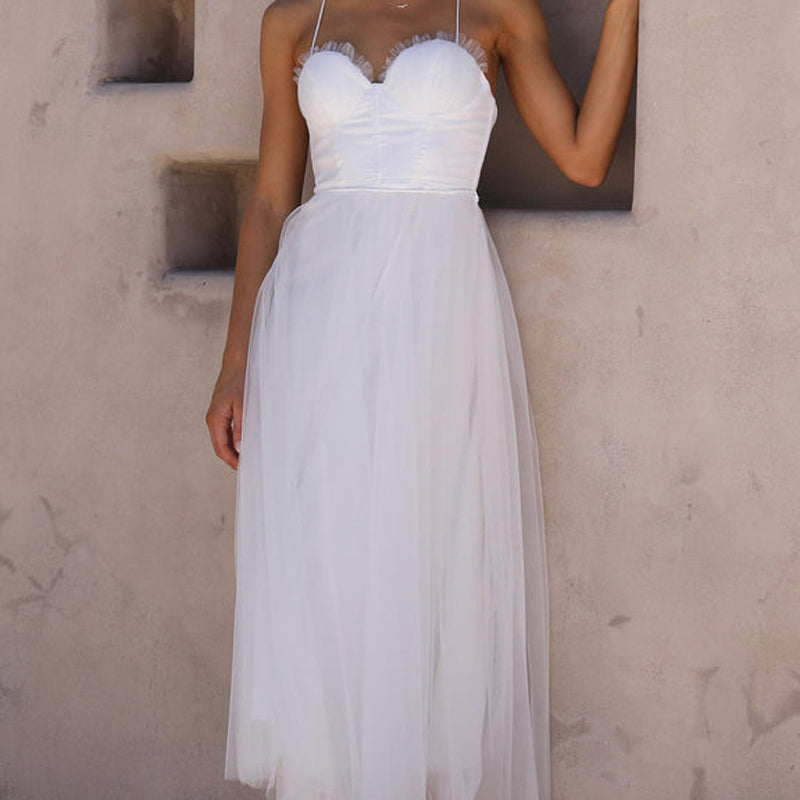 Elegant white tulle dress from ELEGANT SLING DRESS collection, perfect for a sexy sling dress look