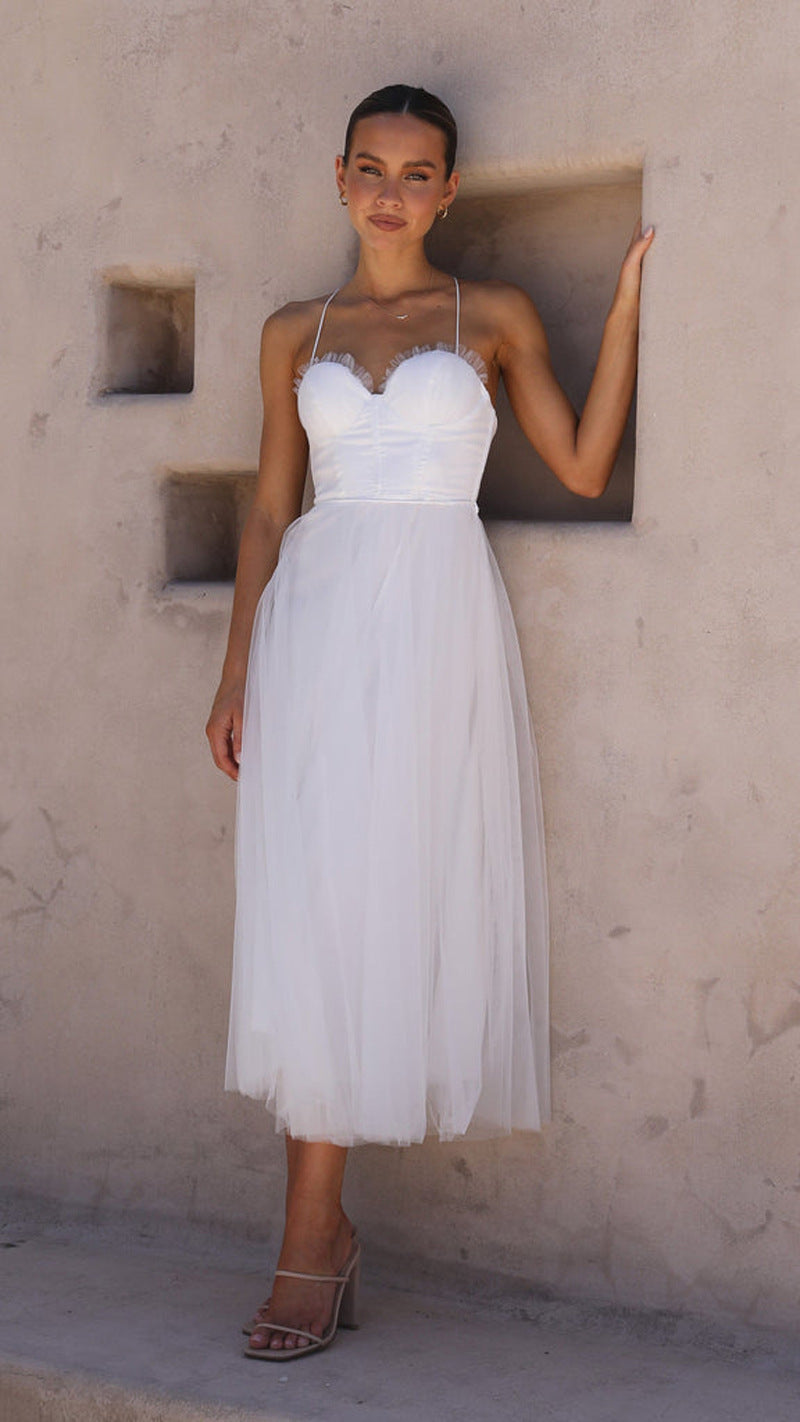 Elegant white tulle dress from ELEGANT SLING DRESS collection, perfect for a sexy sling dress look