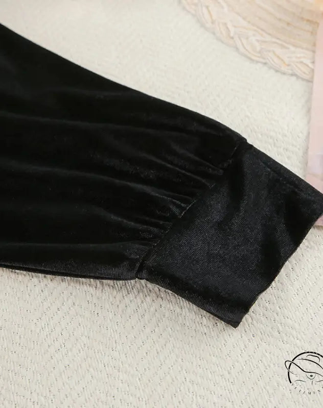 Black velvet sleeve with fitted cuff on comfortable cardigan thermal pajamas