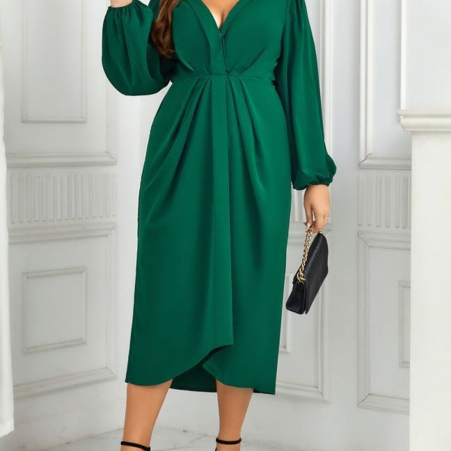 V-NICK Green Dress: Plus-size dark green midi with V-neck, pleated bodice, asymmetrical hem