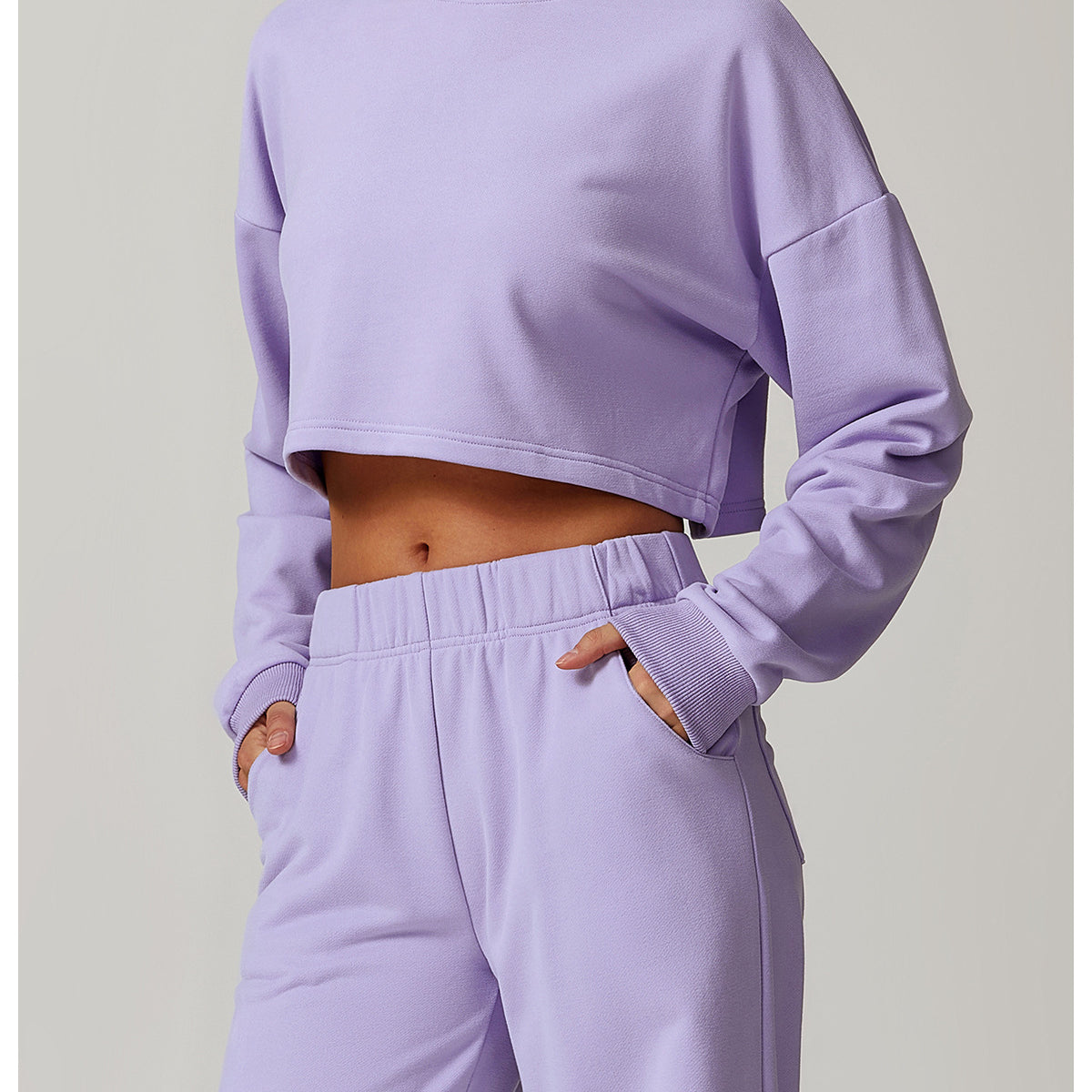 Lavender cropped sweatshirt and pants set for fashion-forward long sleeve workouts