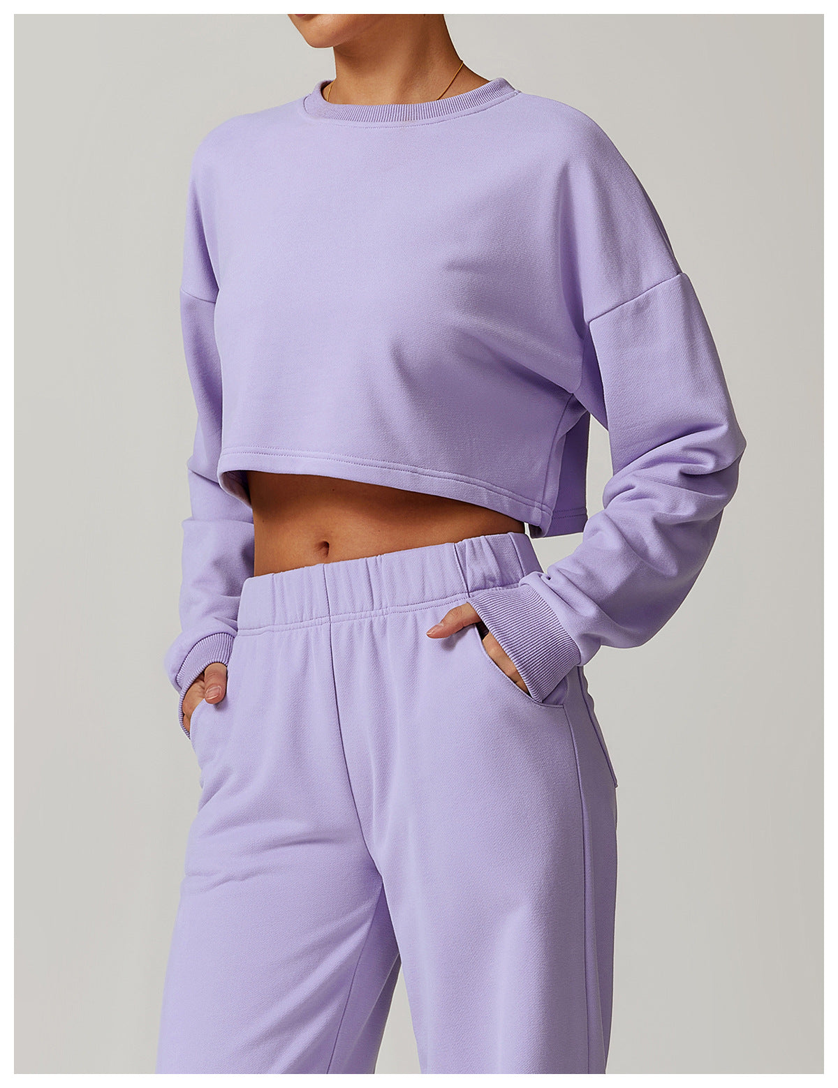 Lavender cropped sweatshirt and pants set for fashion-forward long sleeve workouts