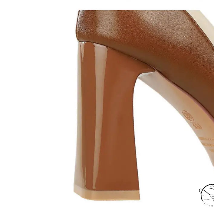 Fashionable langry tan and white block heel sandal with glossy finish