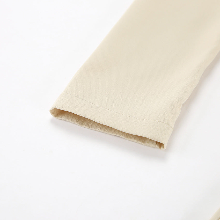 Beige fabric sleeve from Elegant Puff Sleeve Tight Split Dress featuring a sleeve tight split design