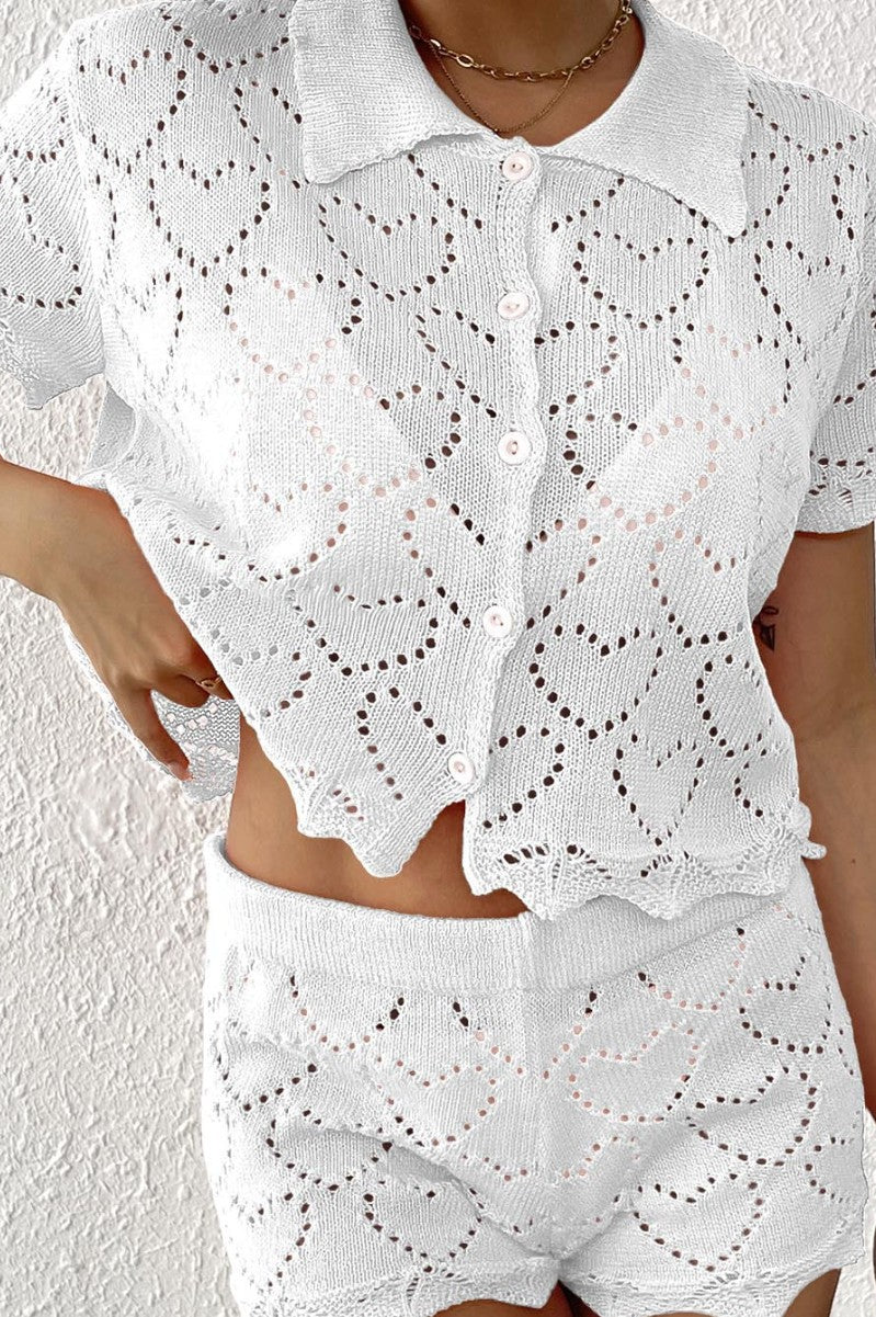 White knitted heart-patterned shorts and collared shirt set for stylish beach fashion