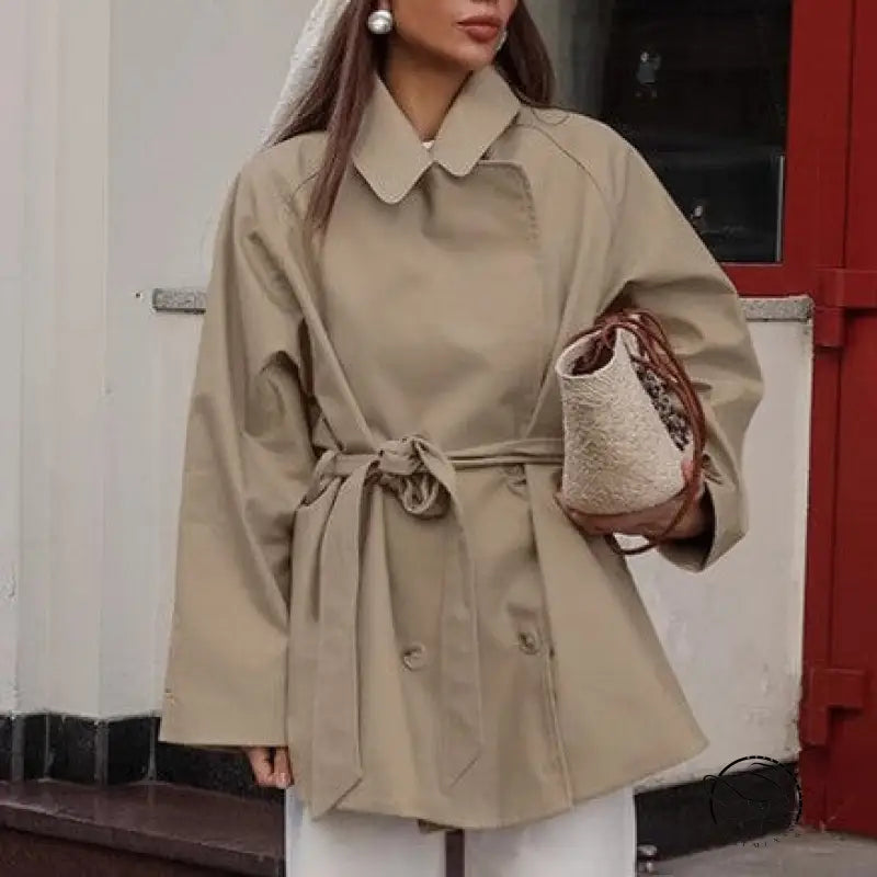 Beige langry fashion trench coat with belt detail in cozy mid-length style