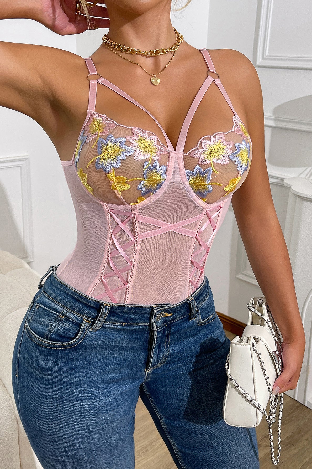 Pink floral corset top with embroidery, sheer mesh, and lace details by Langry fashion