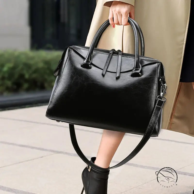 Elegant black leather langry fashion tote bag with silver hardware