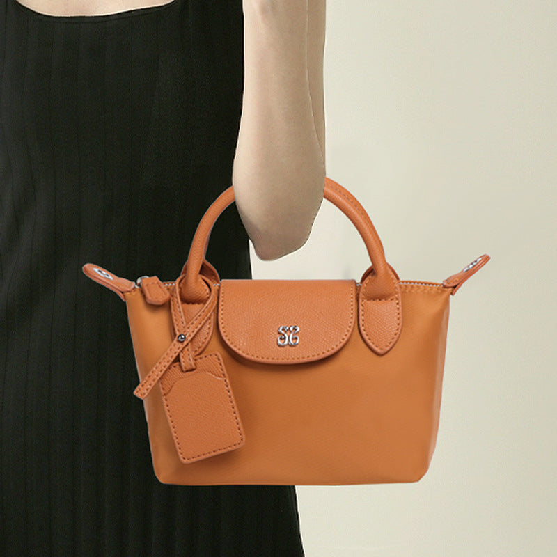Orange leather handbag with flap closure from Mini All Match Shoulder Bag for stylish fashion