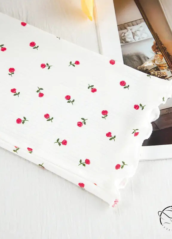 White floral langry pajamas with red rose pattern and scalloped edge
