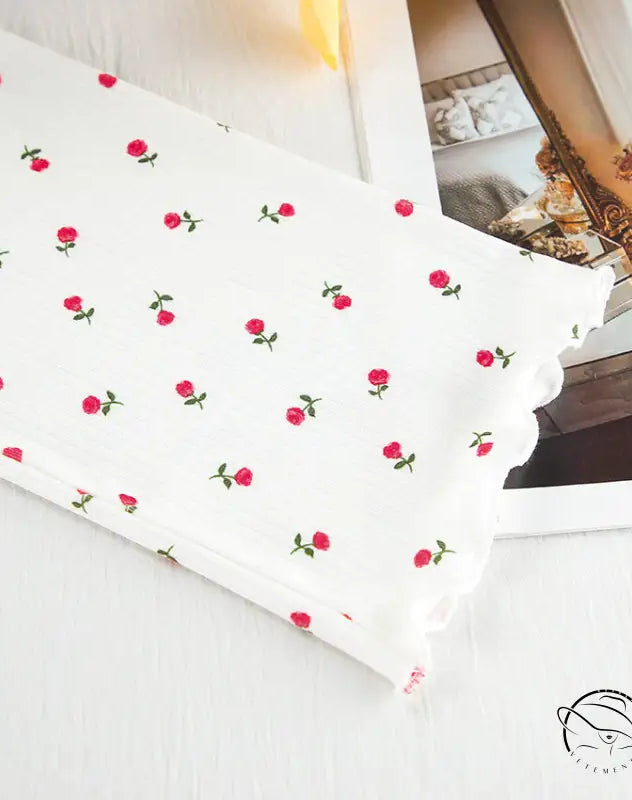 White floral langry pajamas with red rose pattern and scalloped edge