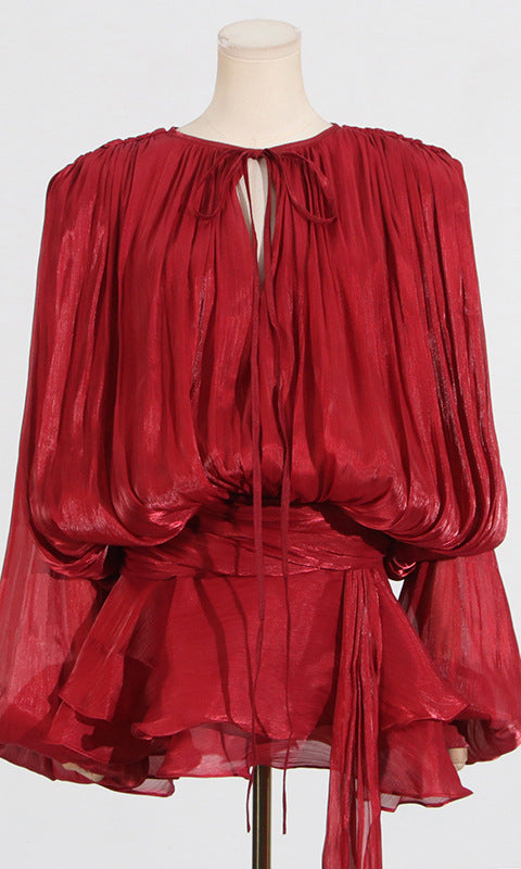 Red long-sleeved tie-neck blouse, a chic piece in the Langry fashion collection