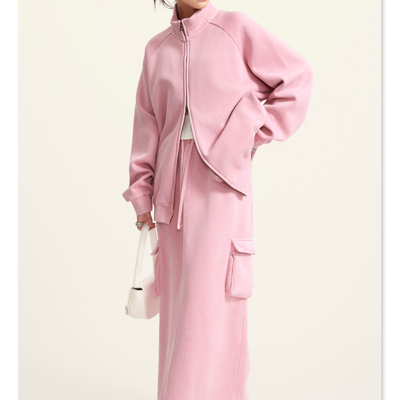 Pink zip-up jacket and matching maxi skirt ensemble with cargo pockets for trendy winter fashion