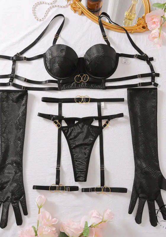 Passion underwear five piece set: black leather lingerie with gold accents and long gloves