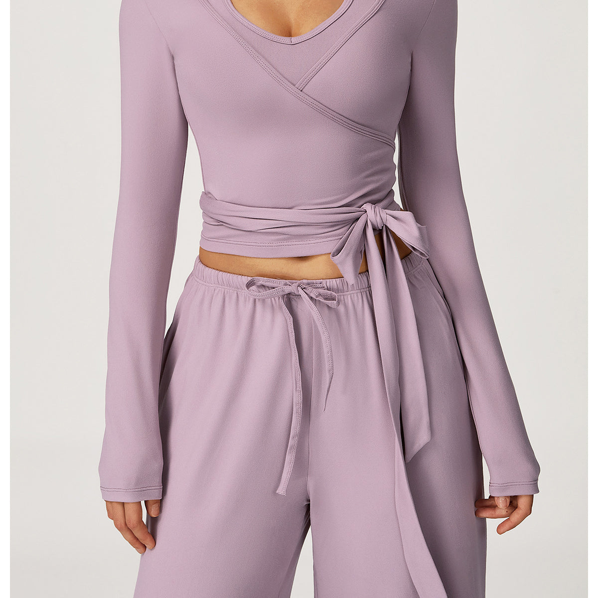 Langry fashion lavender wrap top with stretchy yoga pants and tie waistband