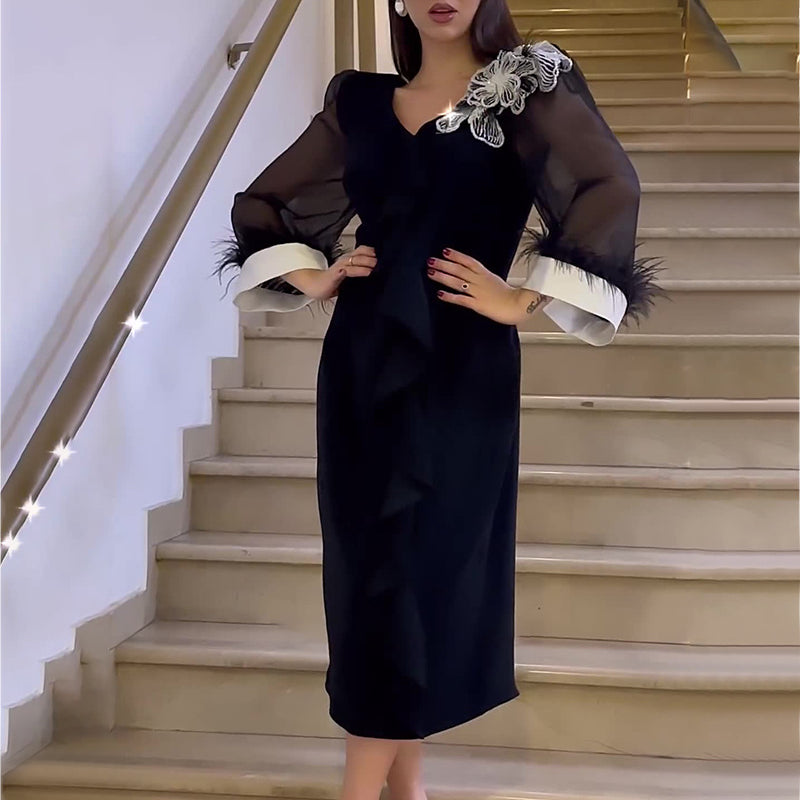 Elegant black long sleeve dress with sheer sleeves from Autumn V neck collection