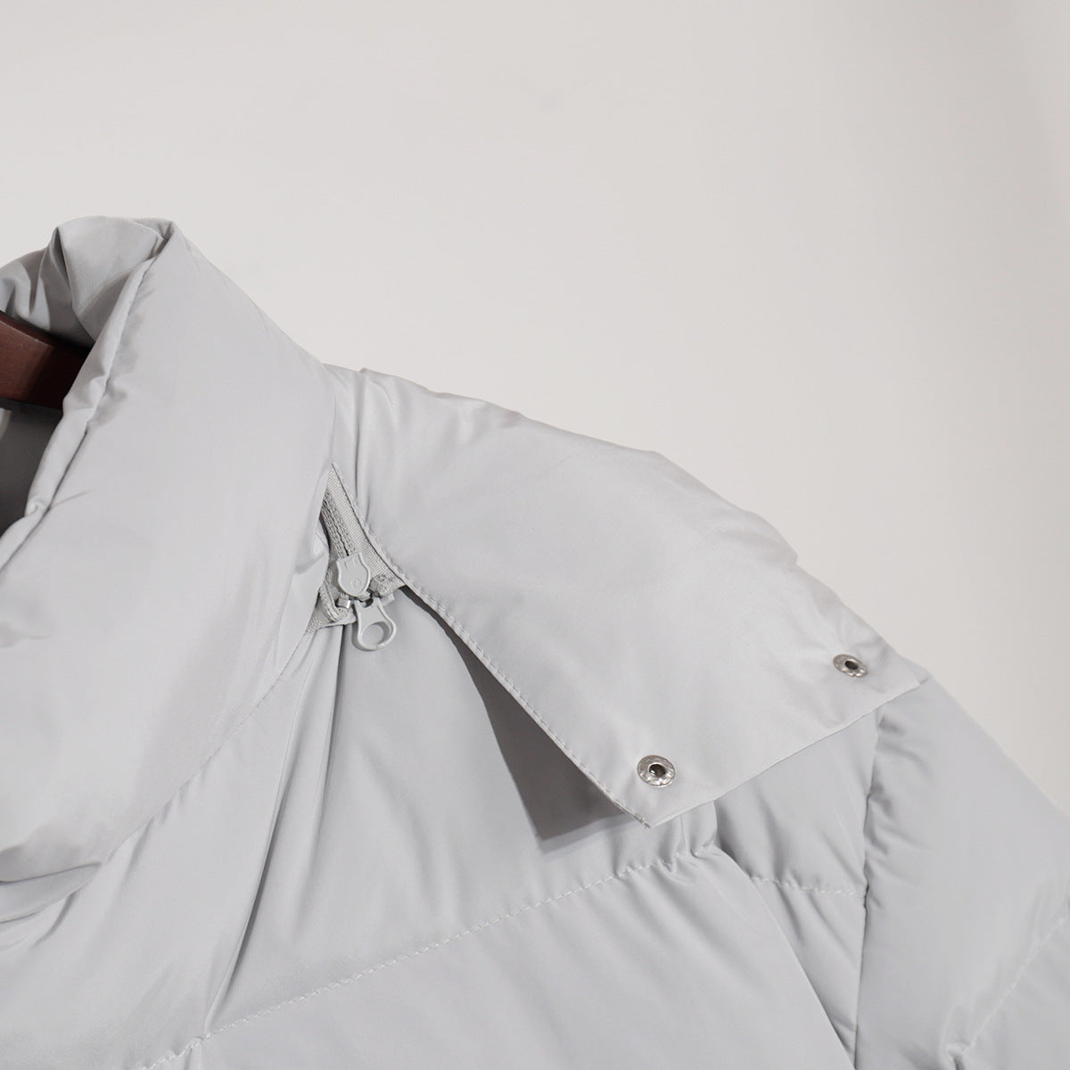 Gray puffer jacket collar on a Cotton Coat Jacket, perfect for fashionable winter ملابس