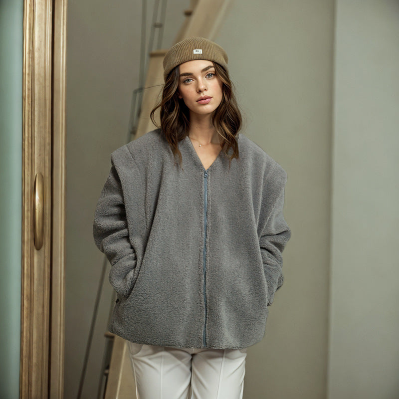 Woman in gray fleece jacket showcasing casual fashion in ملابس by Langry