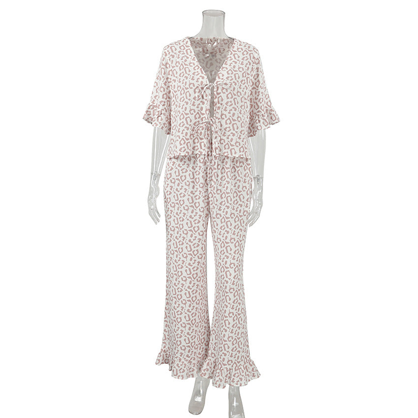 Leopard print two-piece pajama set with ruffled short sleeves and flared pants for home wear