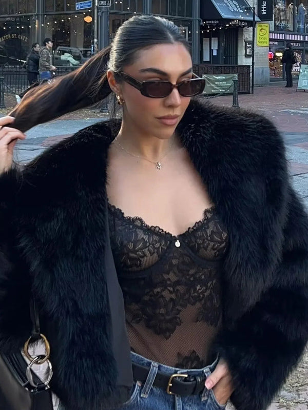 Gorgeous faux fur Langry fox jacket with lace top and jeans