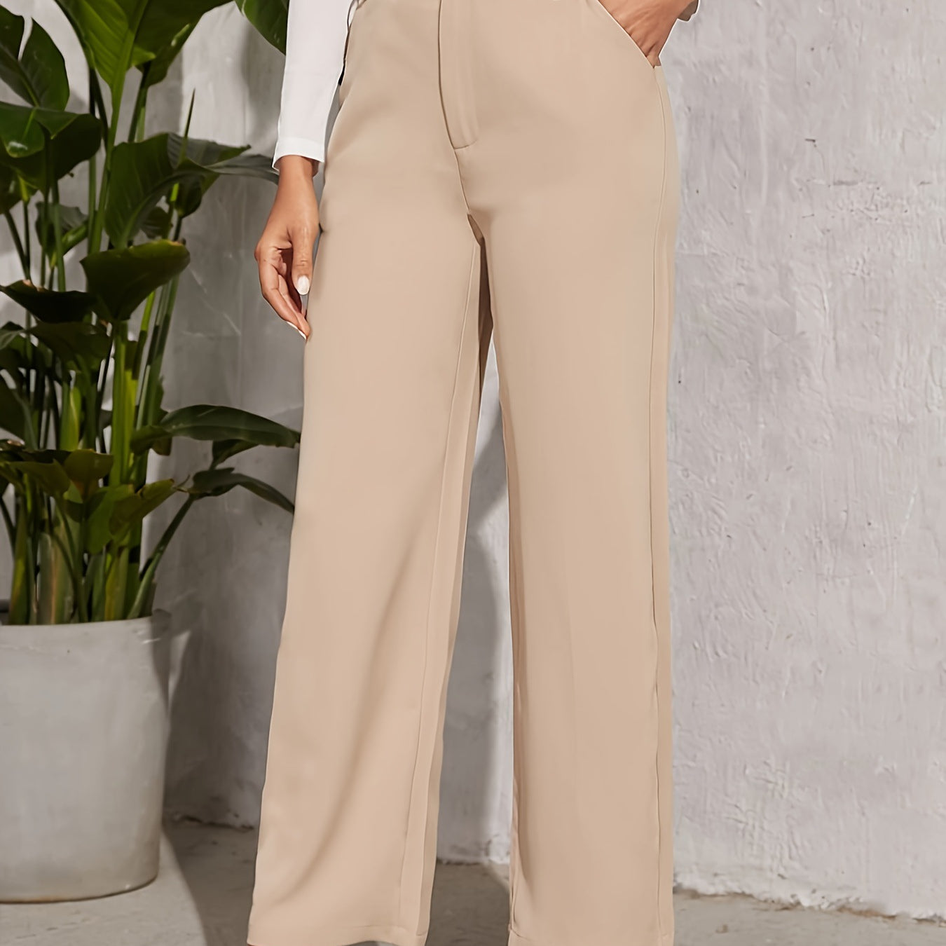 High-waisted beige wide-leg trousers with side pockets for stylish casual fashion ملابس