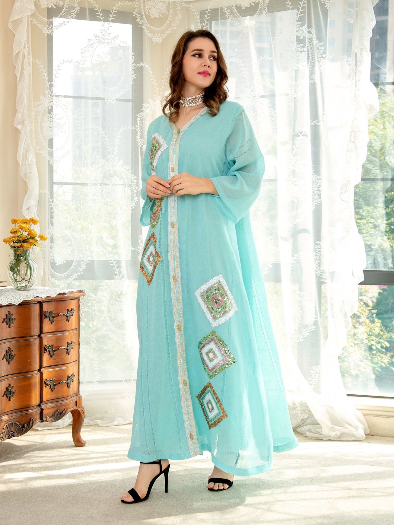 Light blue langry fashion abaya with floral embroidery and geometric patterns