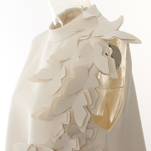 Elegant white garment with layered leaf embellishments from Winter Butterfly Shape Evening Dress, perfect for fashion and ملابس enthusiasts