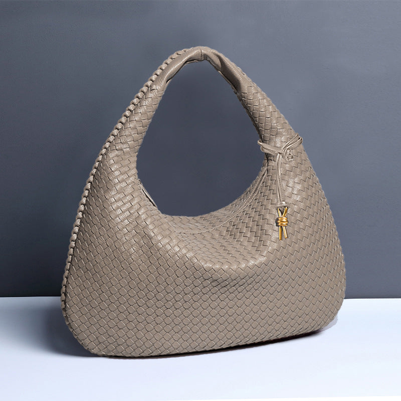 Woven leather hobo bag from Langry, a stylish choice for casual fashion ملابس