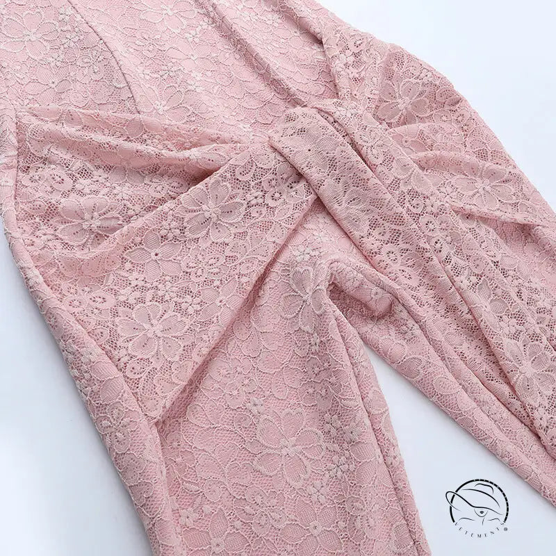 Elegant pink lace wrap dress with floral pattern and tie waist in langry fashion