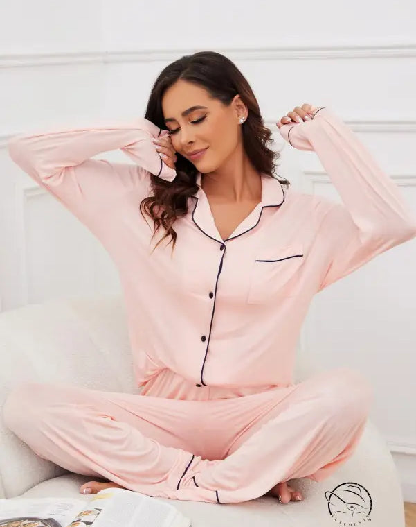 Pink long-sleeve modal pajama set with black piping for women