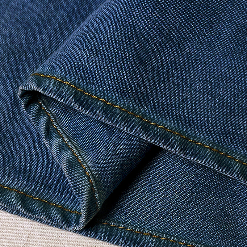 Blue denim fabric with gold stitching for Casual Top Denim, showcasing luxurious fashion and ملابس