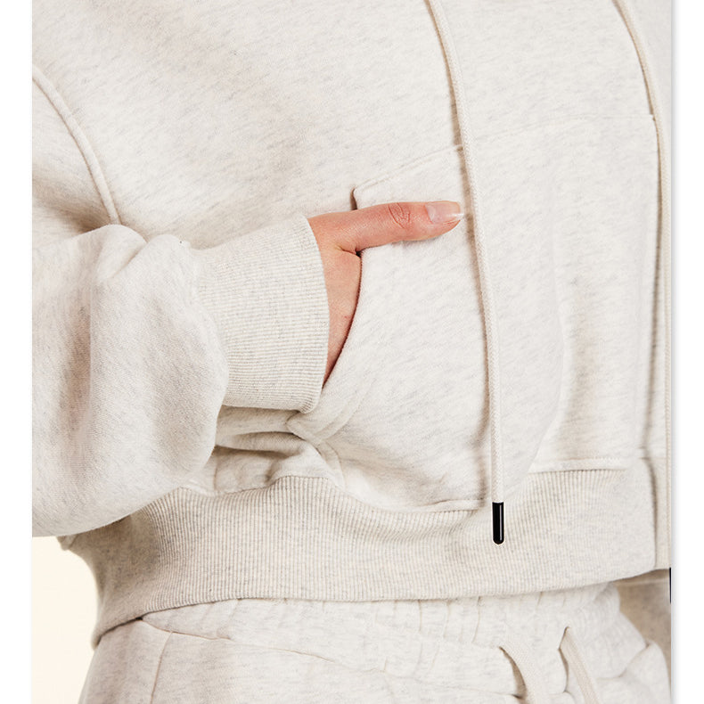 Cream-colored Winter Retro Hooded Pullover with wide sleeves and a gold chain necklace