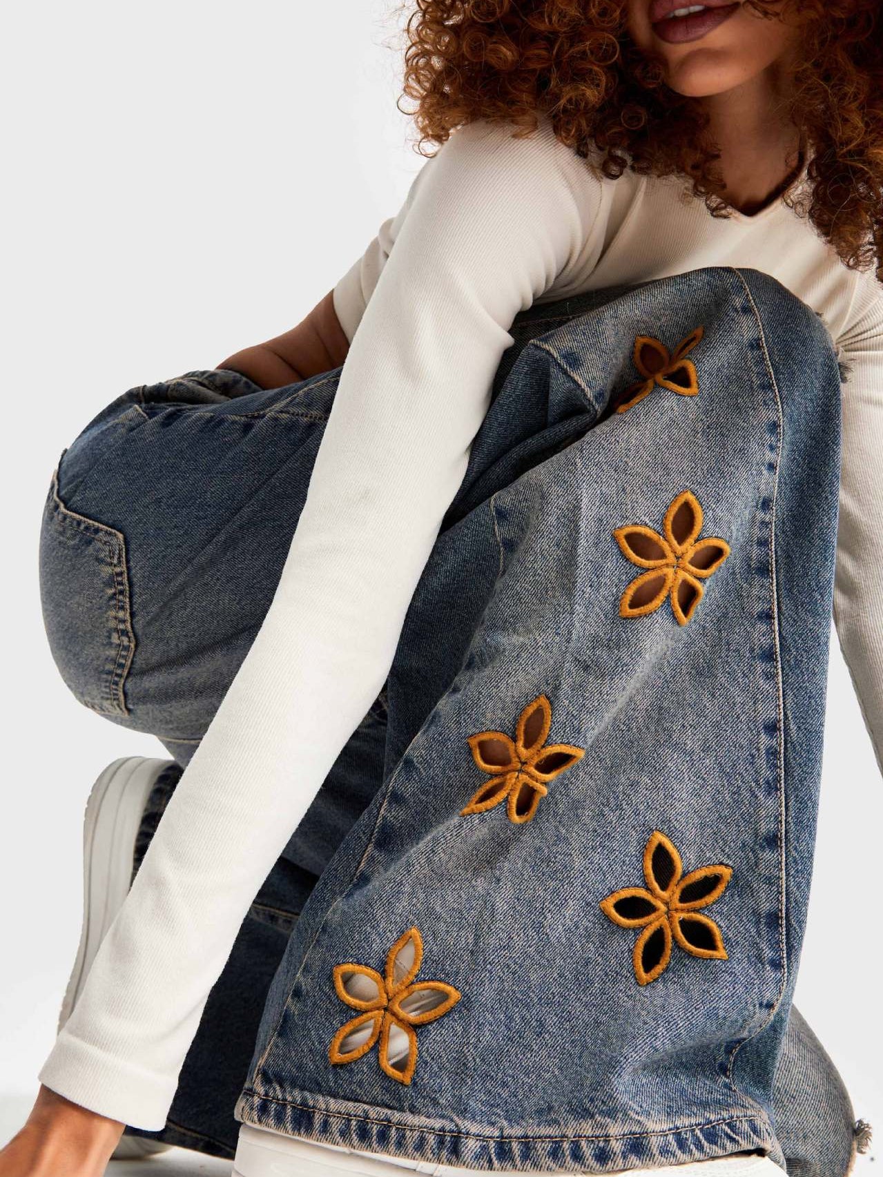 Fashionable high-waist Langry denim trousers with orange-yellow floral embroidered jacket