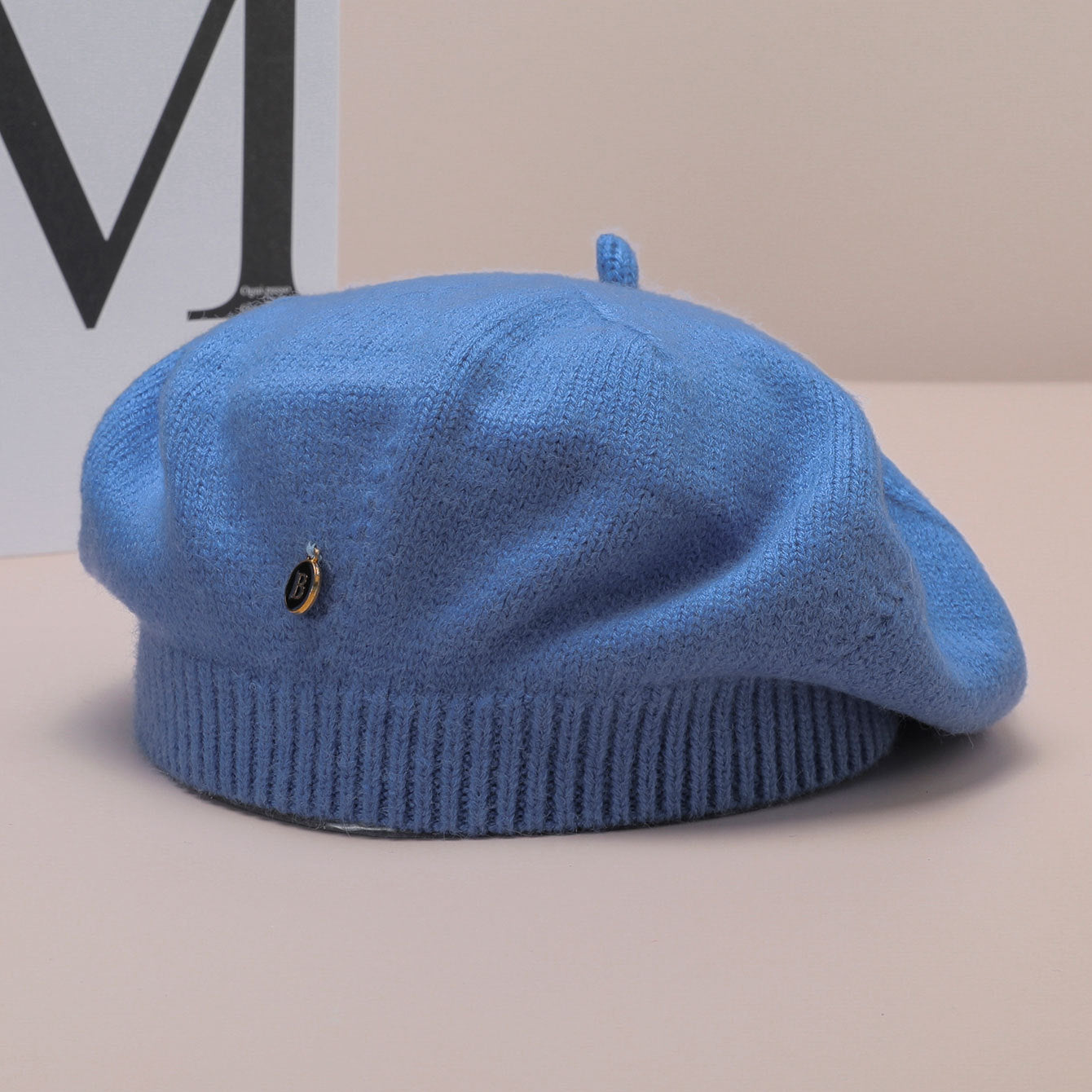 Light blue knitted beret from Knitted Korean Small Painter Cloud Hat for fashion and ملابس