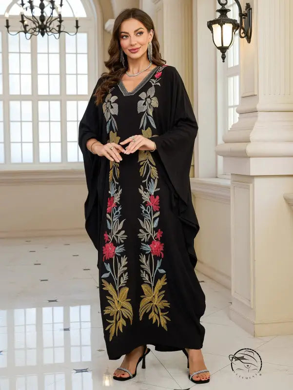Elegant embroidered black abaya dress with long sleeves and V-neckline