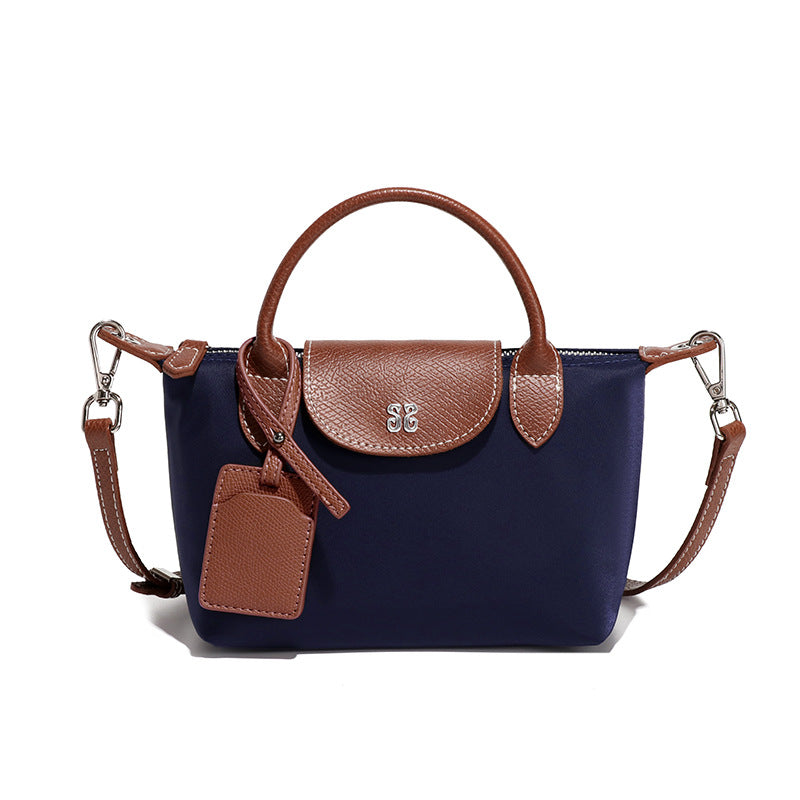 Navy blue Mini All Match Shoulder Bag with brown leather accents for stylish fashion