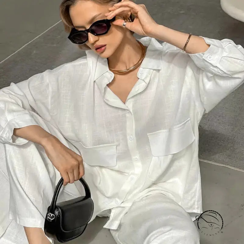 Woman in pure cotton cardigan loose pajamas with sunglasses and necklace