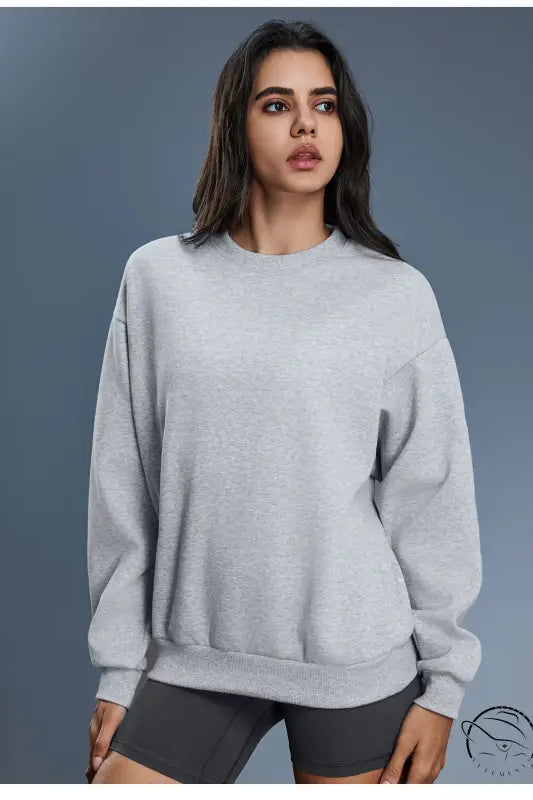 Heather gray long sleeve casual pullover hoodie with ribbed cuffs