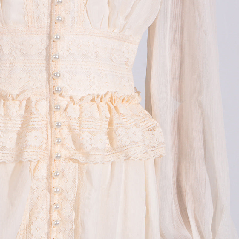 Cream-colored lace dress with pearl buttons showcasing elegant langry fashion and ملابس style