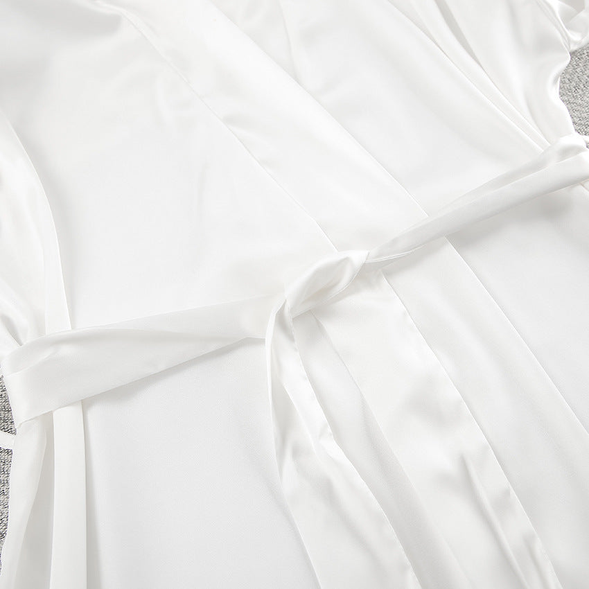 White pleated langry satin dress with elastic waist and scalloped hem