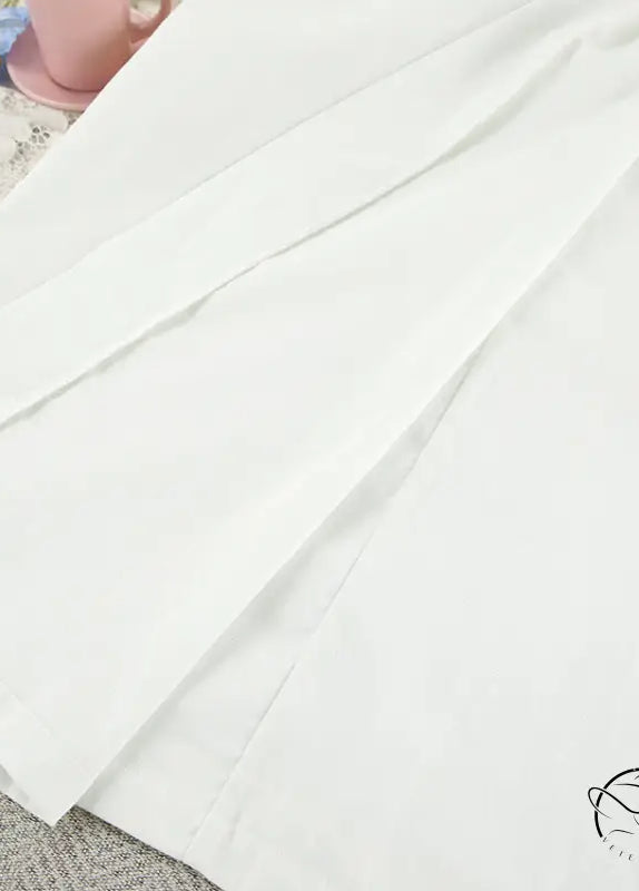 White cotton langry nightgown with smooth texture and neat stitching