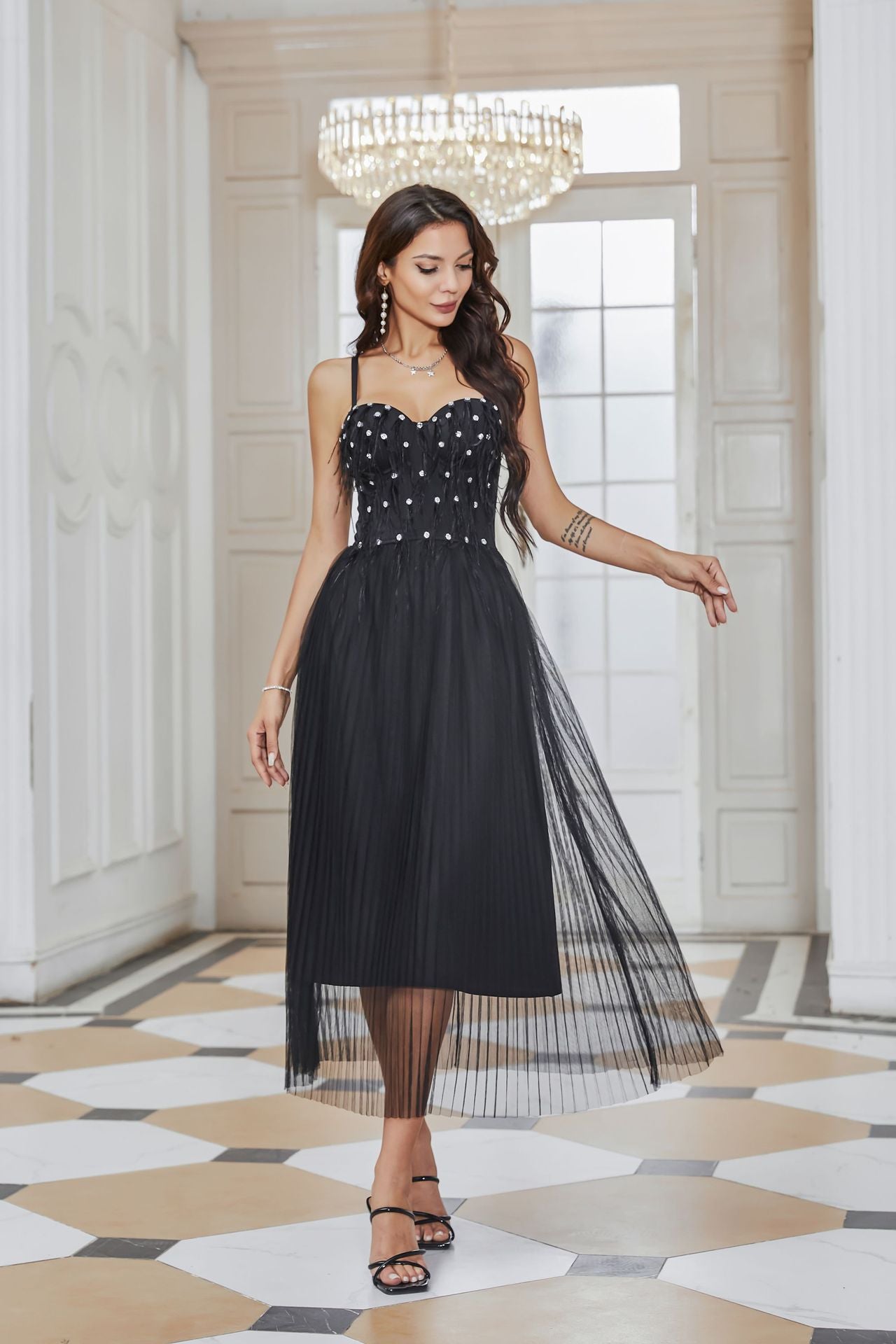 Elegant black tulle dress perfect for formal occasions and sophisticated fashion styles