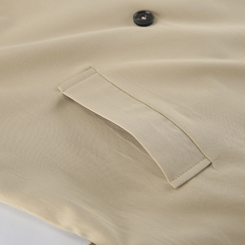 Beige langry trench coat with button-down pocket detail