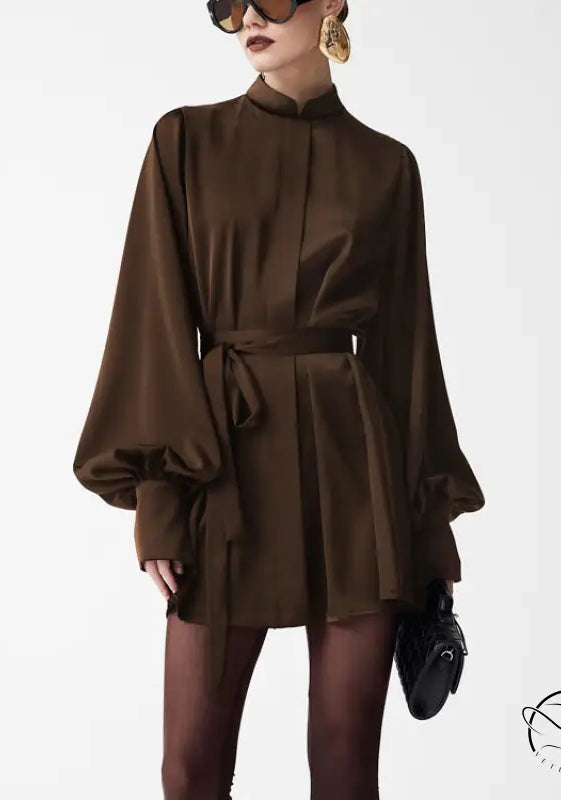 Beautiful lace up A-line short dress in sleek chocolate-brown satin with voluminous long sleeves and high collar