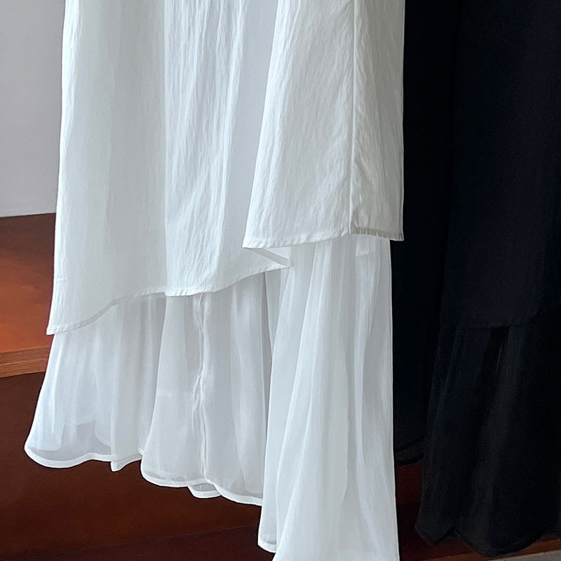 Flowing white layered ruffled fabric of an elegant Korean style dress