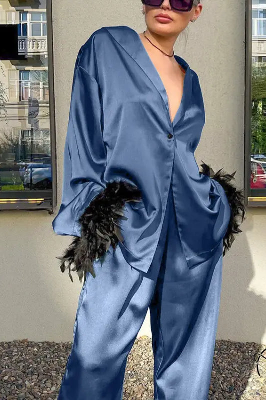 Blue satin langry fashion pajamas with feather accents and button-down front