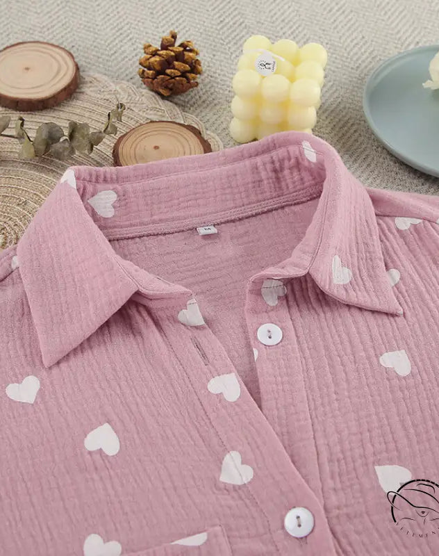 Pink long-sleeved cotton pajamas set with white heart patterns